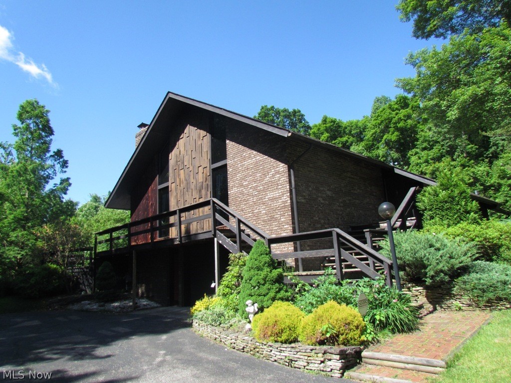 12215 Snow Road Burton, OH 44021 - Photo 1 of 35 Front and side view