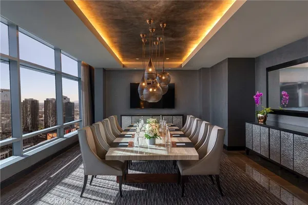a living room with patio furniture
