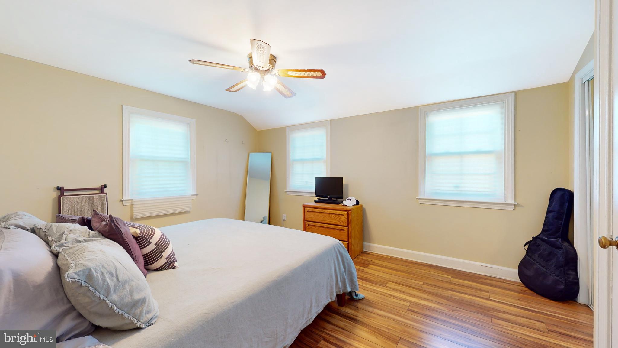 769 Ardmore Avenue Ardmore, PA 19003 - Photo 17 of 40 a bedroom with a bed and wooden floor