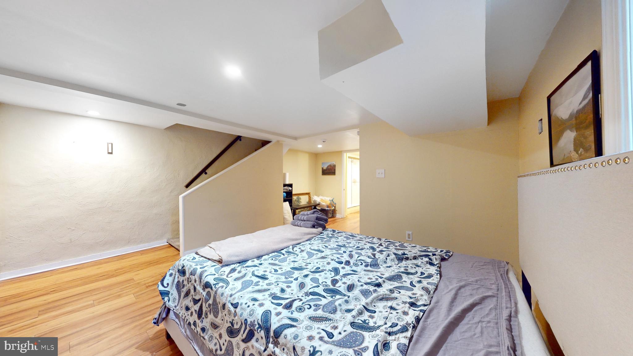 769 Ardmore Avenue Ardmore, PA 19003 - Photo 25 of 40 a bedroom with a bed and a window