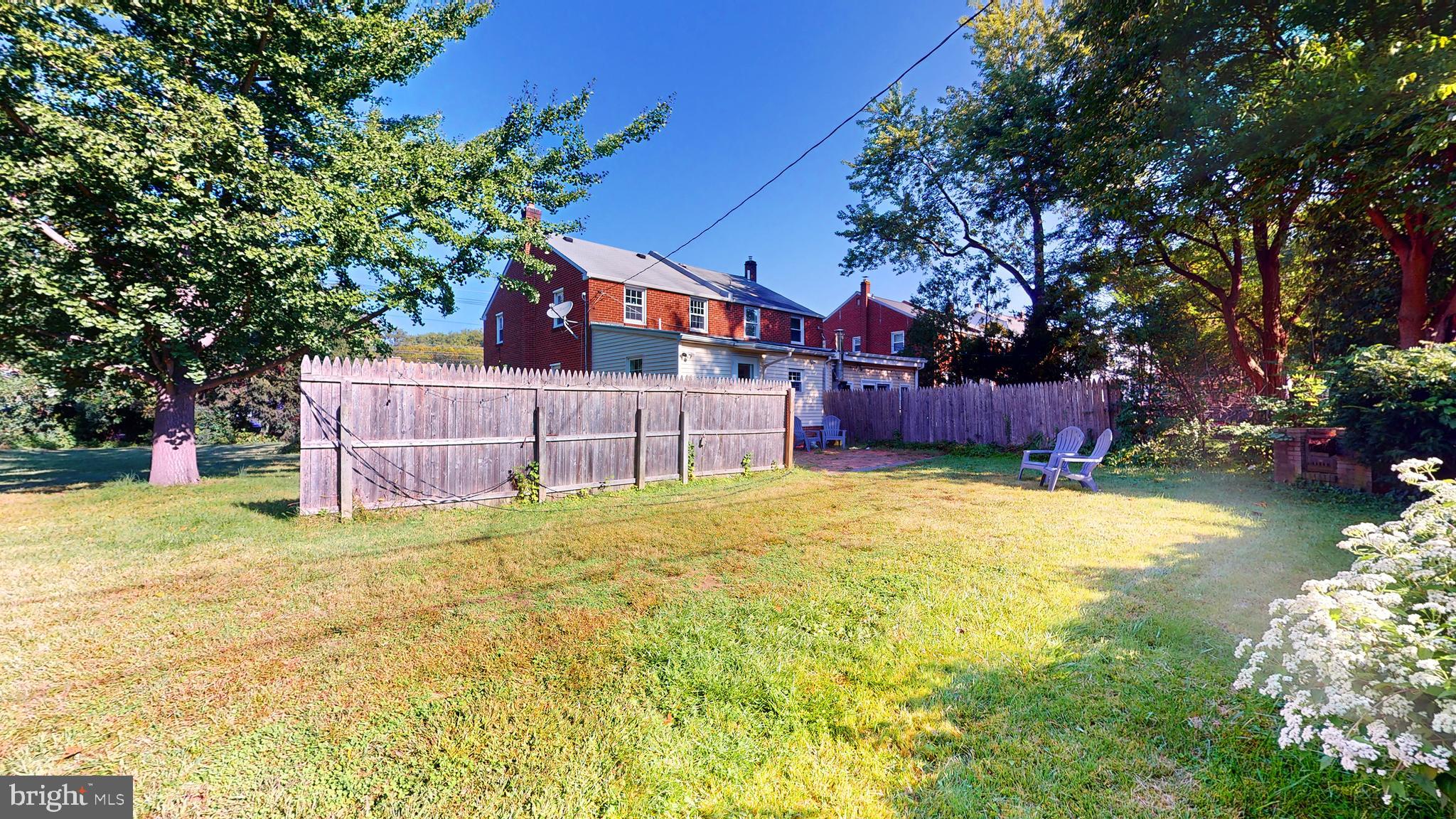 769 Ardmore Avenue Ardmore, PA 19003 - Photo 34 of 40 a yellow house in middle of the garden