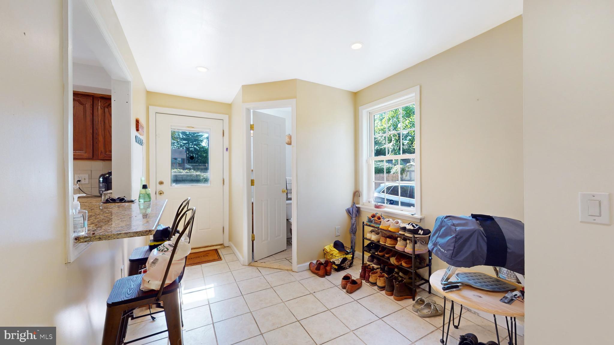 769 Ardmore Avenue Ardmore, PA 19003 - Photo 10 of 40 a view of a workspace with furniture and a window