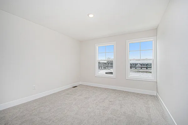 an empty room with windows