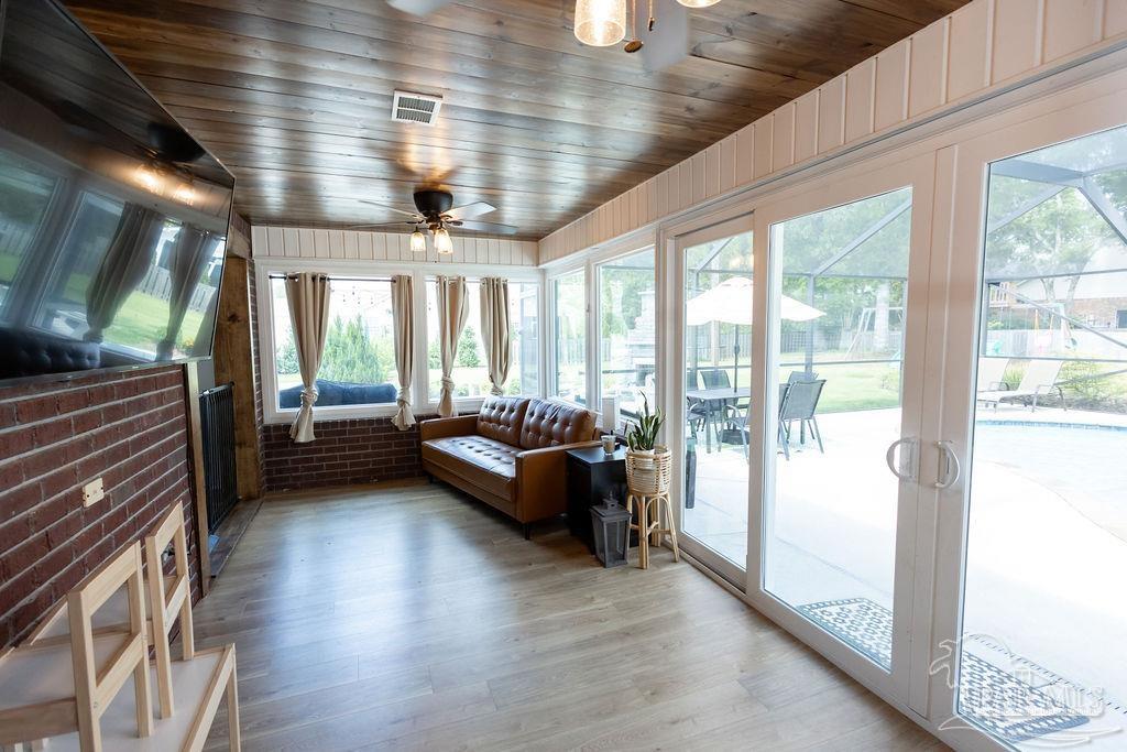 3059 Cobblestone Drive Pace, FL 32571 - Photo 13 of 45 a living room with furniture and a large window