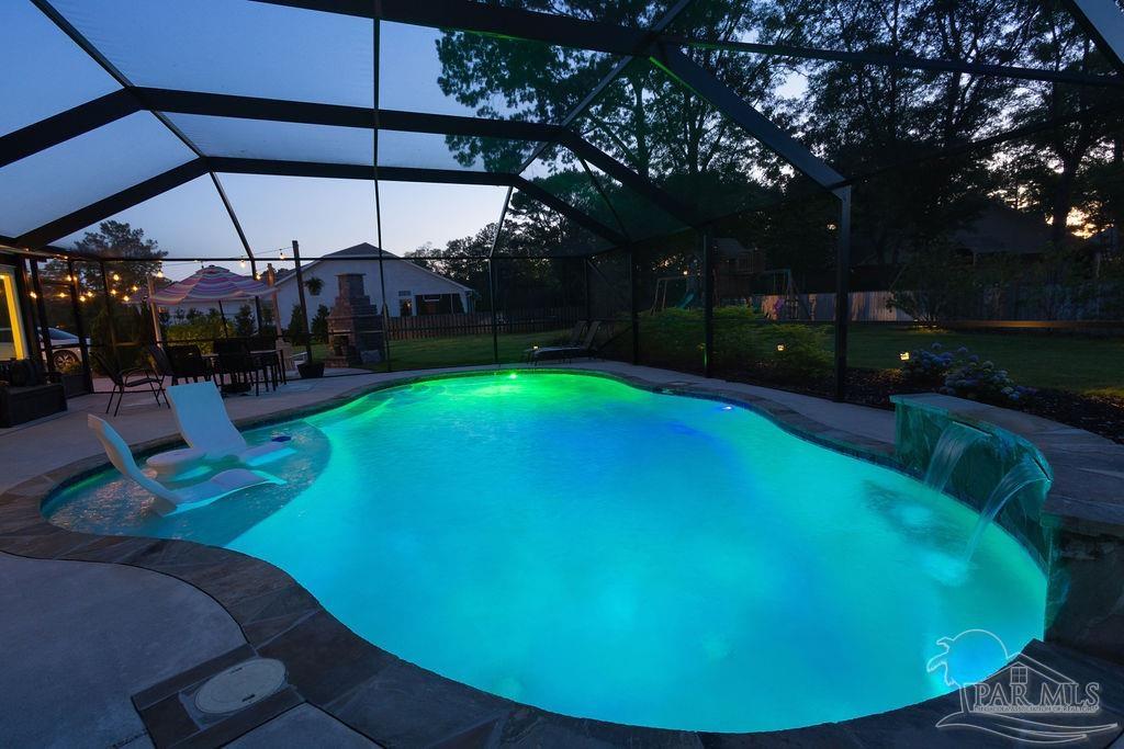 3059 Cobblestone Drive Pace, FL 32571 - Photo 43 of 45 a view of a backyard with sitting area