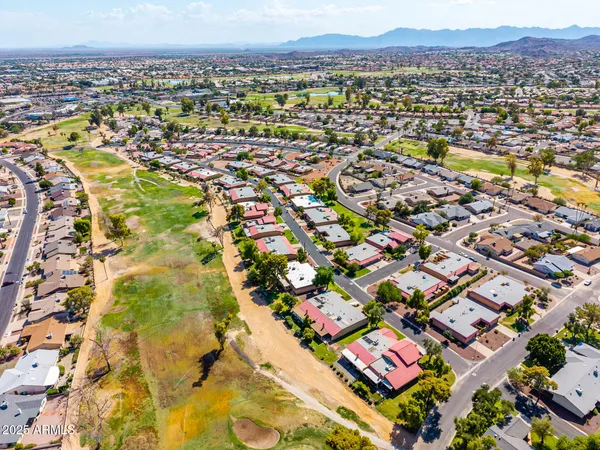 a view of a lake with a big yard