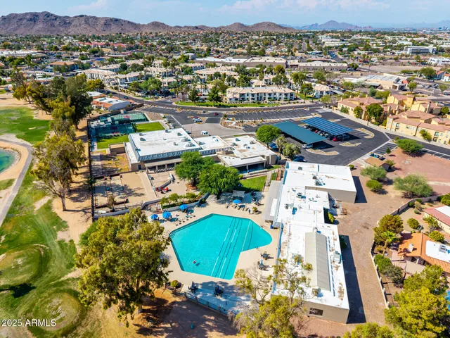 a view of an outdoor space and tennis court