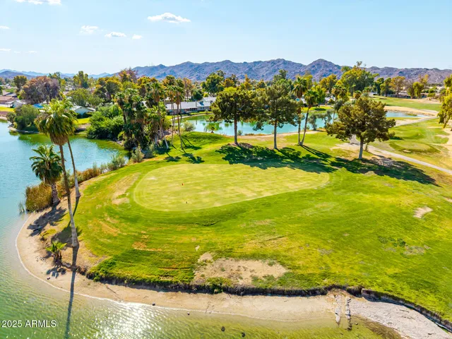 a view of a water heater room with windows