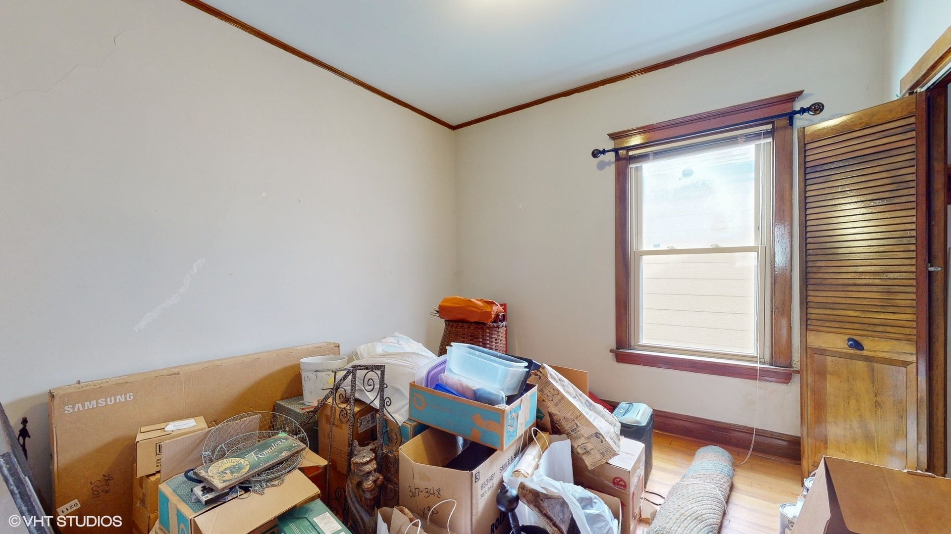 1035 South Ridgeland Avenue Oak Park, IL 60304 - Photo 16 of 43 a bedroom with a bed and wooden floor