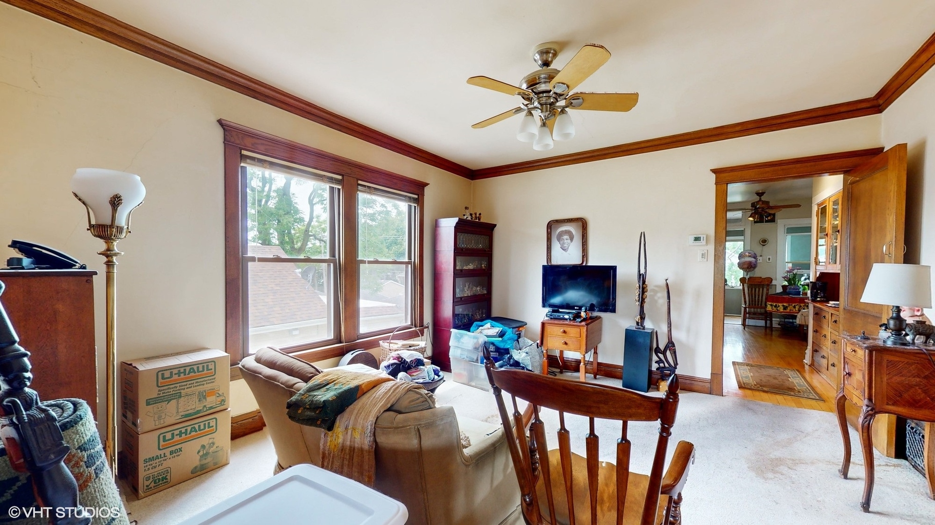 1035 South Ridgeland Avenue Oak Park, IL 60304 - Photo 23 of 43 a living room with furniture fireplace and a flat screen tv