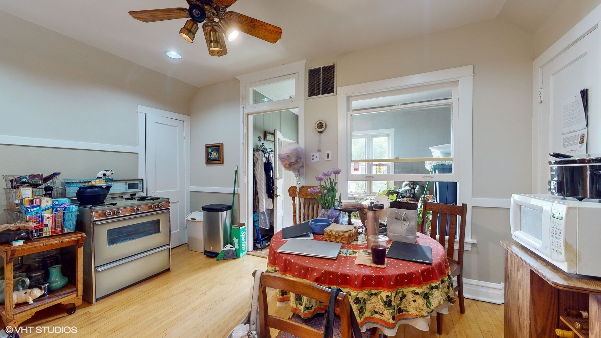 1035 South Ridgeland Avenue Oak Park, IL 60304 - Photo 27 of 43 a view of a dining room with furniture and wooden floor