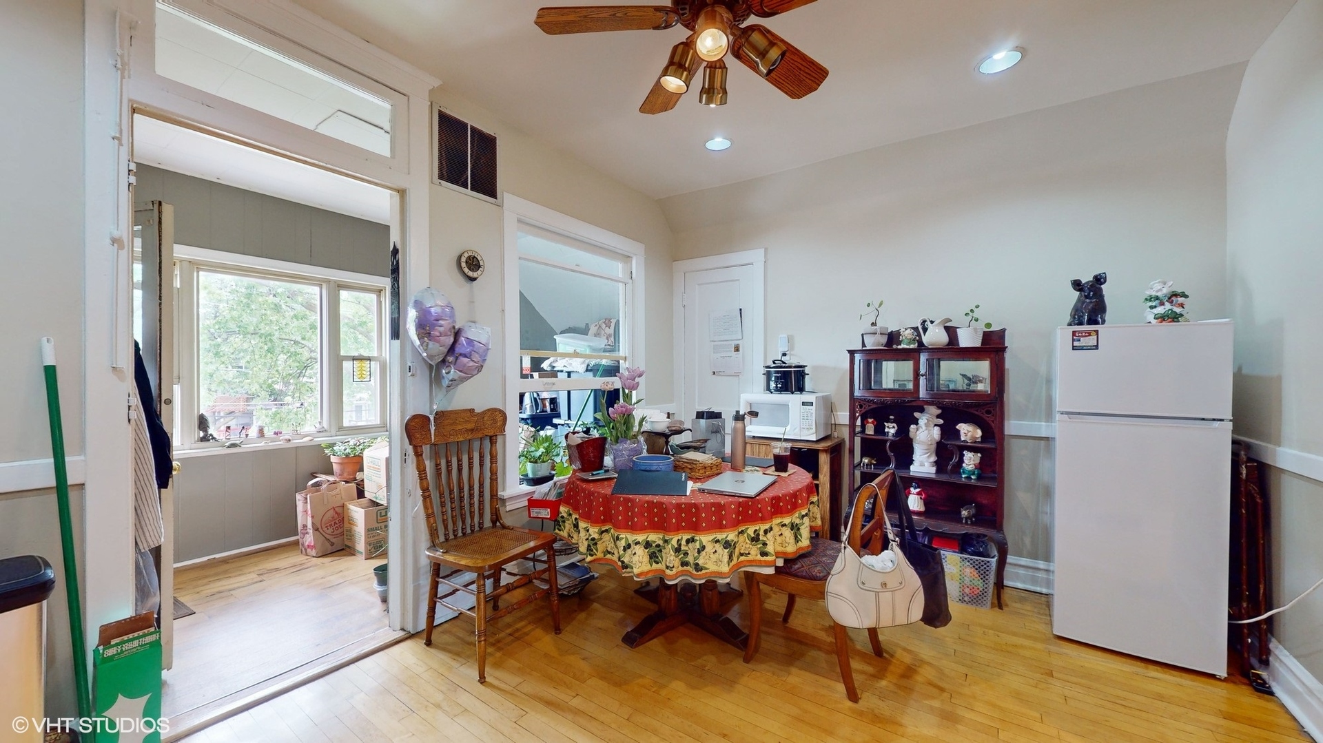 1035 South Ridgeland Avenue Oak Park, IL 60304 - Photo 28 of 43 a view of a dining room with furniture window and wooden floor