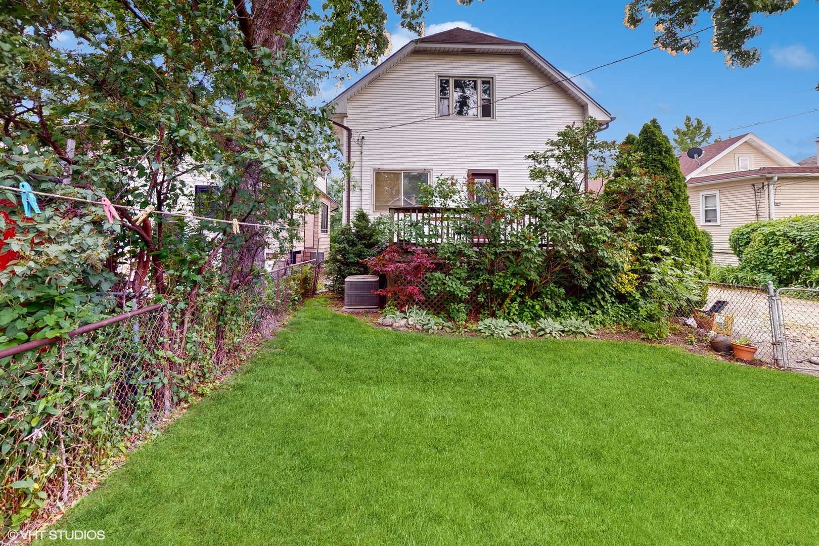 1035 South Ridgeland Avenue Oak Park, IL 60304 - Photo 37 of 43 a front view of a house with a yard