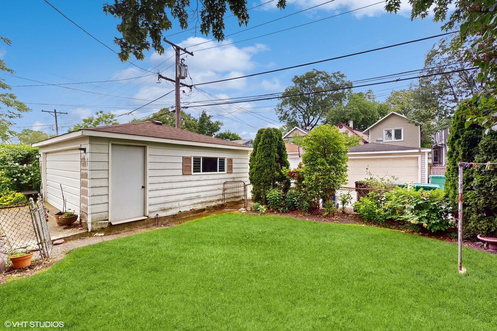 1035 South Ridgeland Avenue Oak Park, IL 60304 - Photo 38 of 43 a view of a house with backyard and garden
