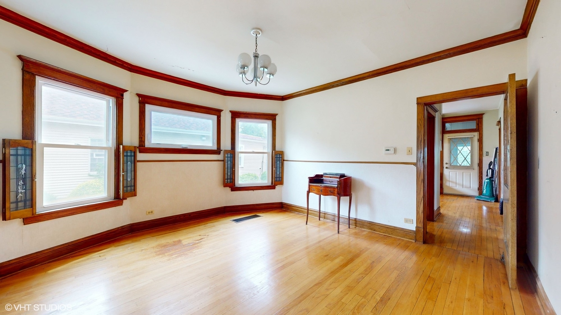 1035 South Ridgeland Avenue Oak Park, IL 60304 - Photo 7 of 43 a view of empty room with a window and wooden floor