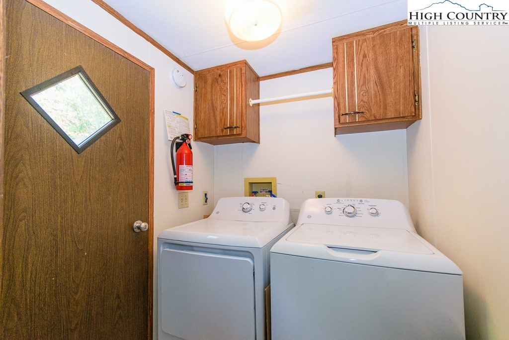 295 Roy E Brown Road Vilas, NC 28692 - Photo 40 of 43 a utility room with dryer and washer