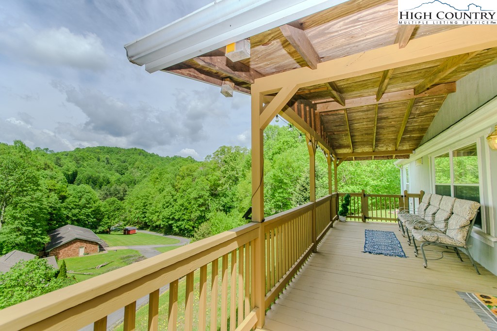 295 Roy E Brown Road Vilas, NC 28692 - Photo 6 of 43 a view of a porch