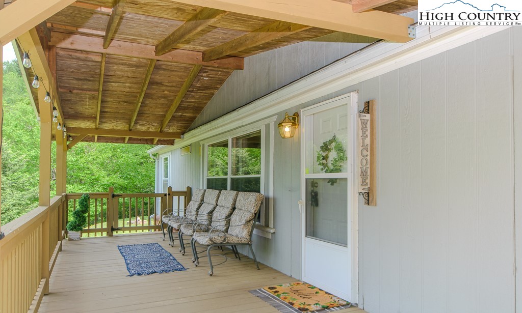 295 Roy E Brown Road Vilas, NC 28692 - Photo 7 of 43 a view of outdoor space with seating area