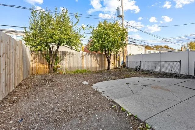 a view of a house with a street