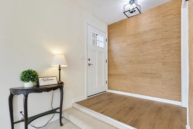 a view of a hallway with workspace