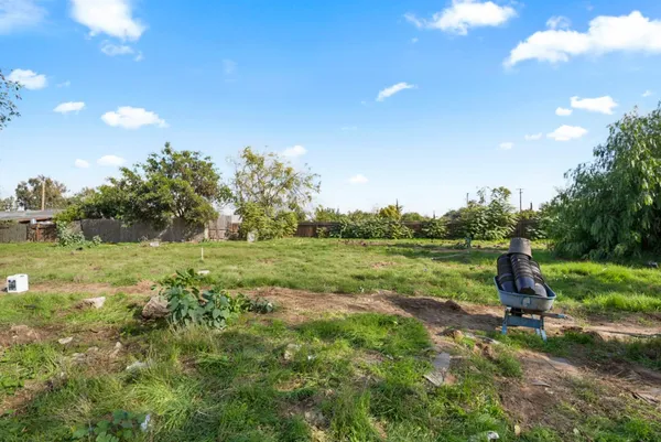 a view of a lake with a yard