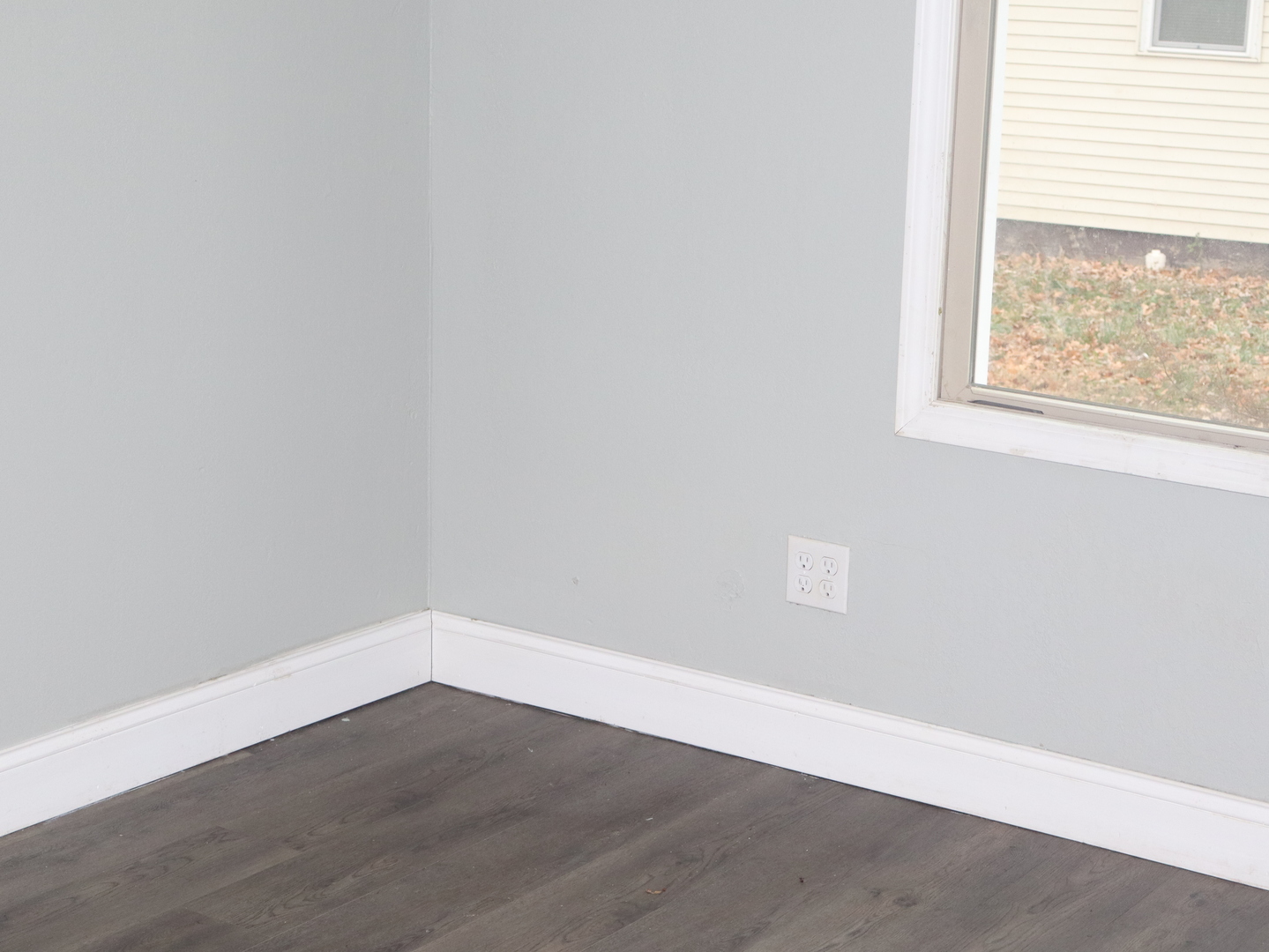 4603 Cleveland Street Streator, IL 61364 - Photo 13 of 16 an empty room with wooden floor and windows