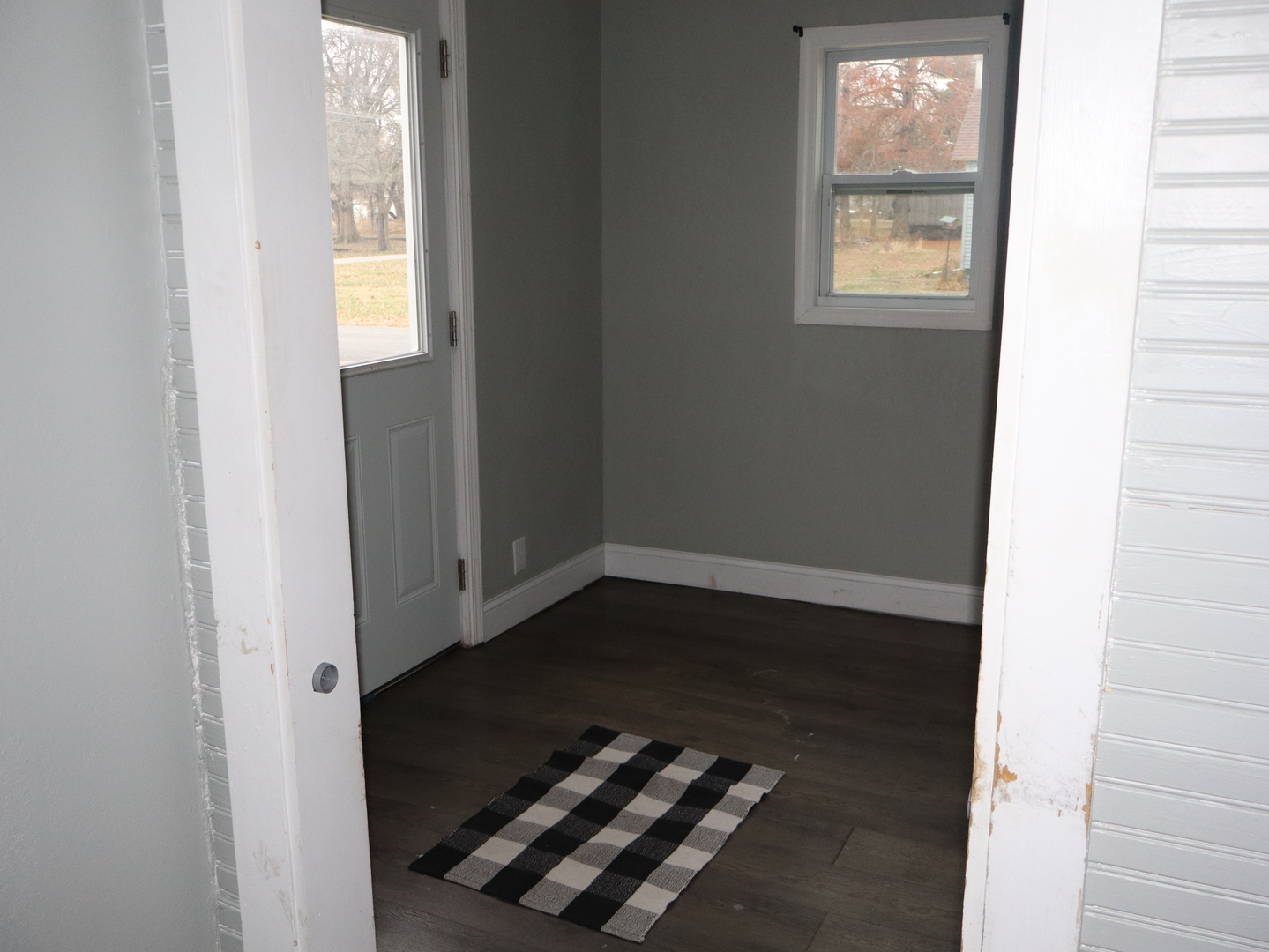 4603 Cleveland Street Streator, IL 61364 - Photo 6 of 16 a view of an entryway with wooden floor