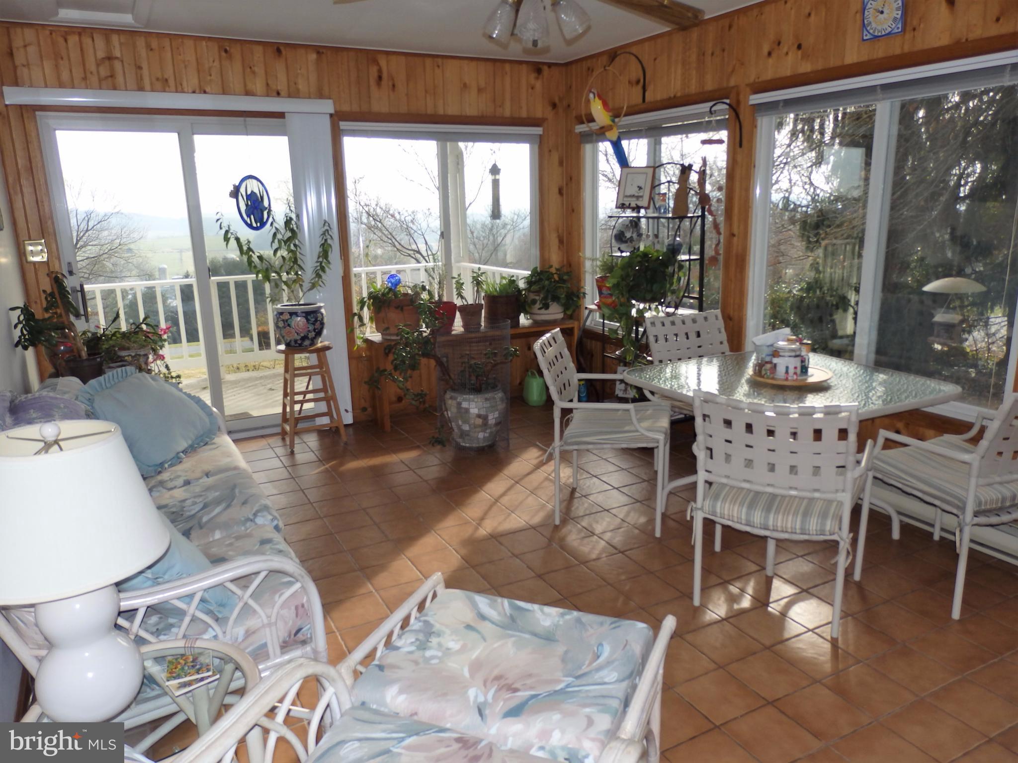 9308 View Court Frederick, MD 21701 - Photo 10 of 30 Sunroom opens to front porch and back yard.
