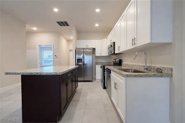 $1,445 | 3221 Southwest 8th Place, Unit 104, Cape Coral, FL 33914