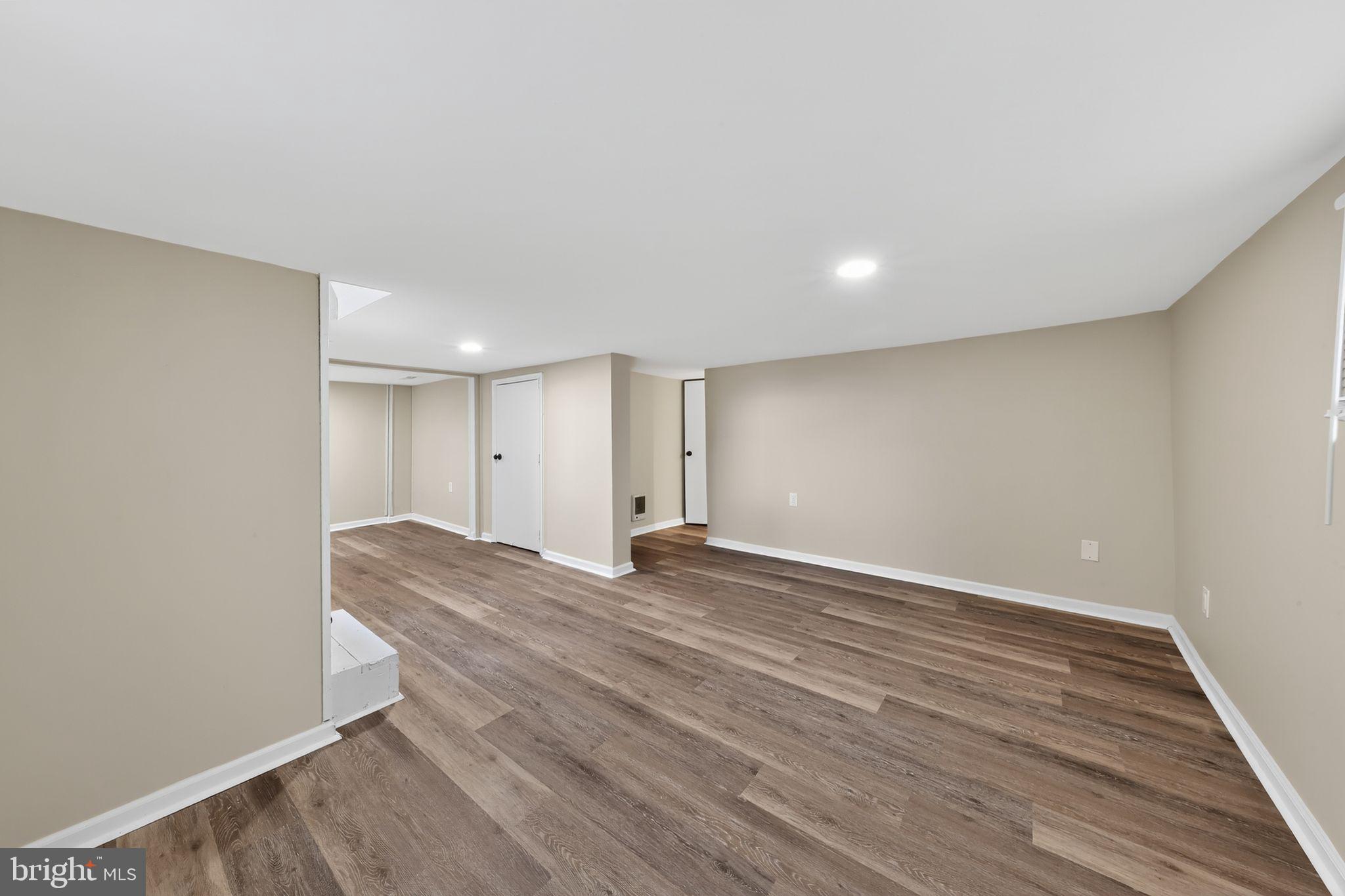 121 Ash Street Carneys Point, NJ 08069 - Photo 24 of 30 a view of empty room with wooden floor