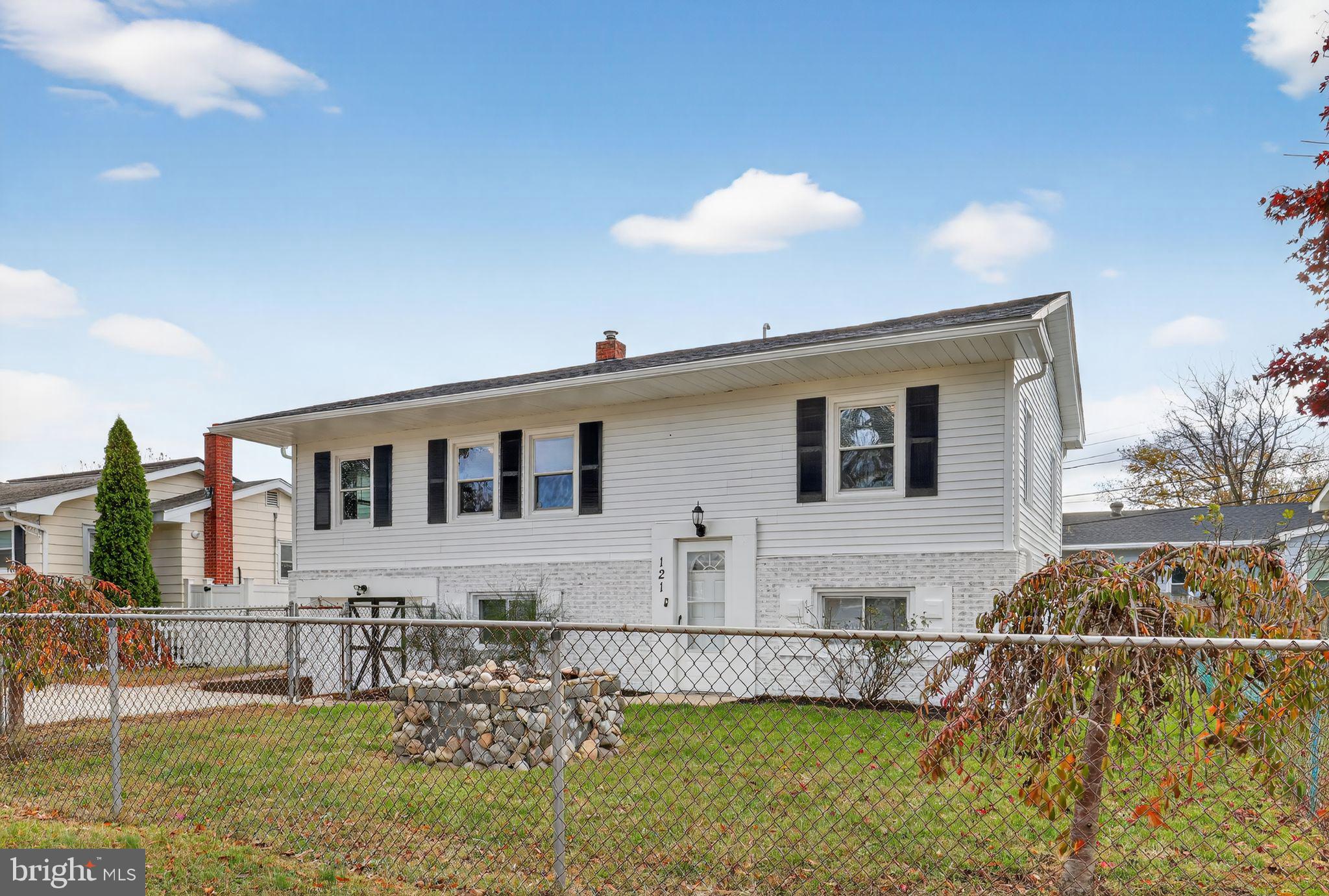 121 Ash Street Carneys Point, NJ 08069 - Photo 3 of 30 a front view of a house with a yard
