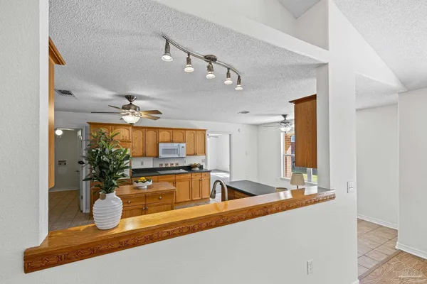 $349,900 | 5092 East Spencer Field Road, Pace, FL 32571