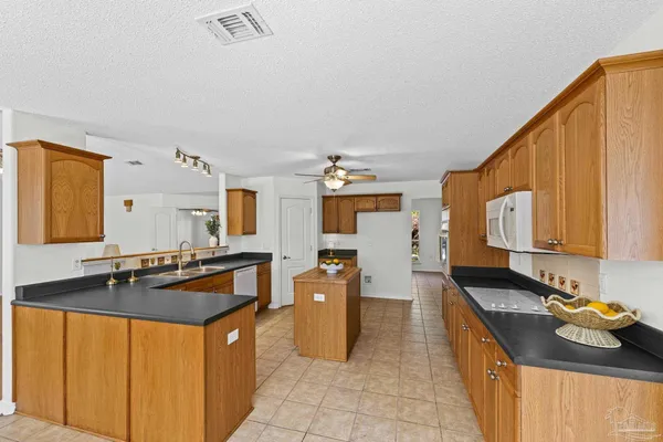 $349,900 | 5092 East Spencer Field Road, Pace, FL 32571