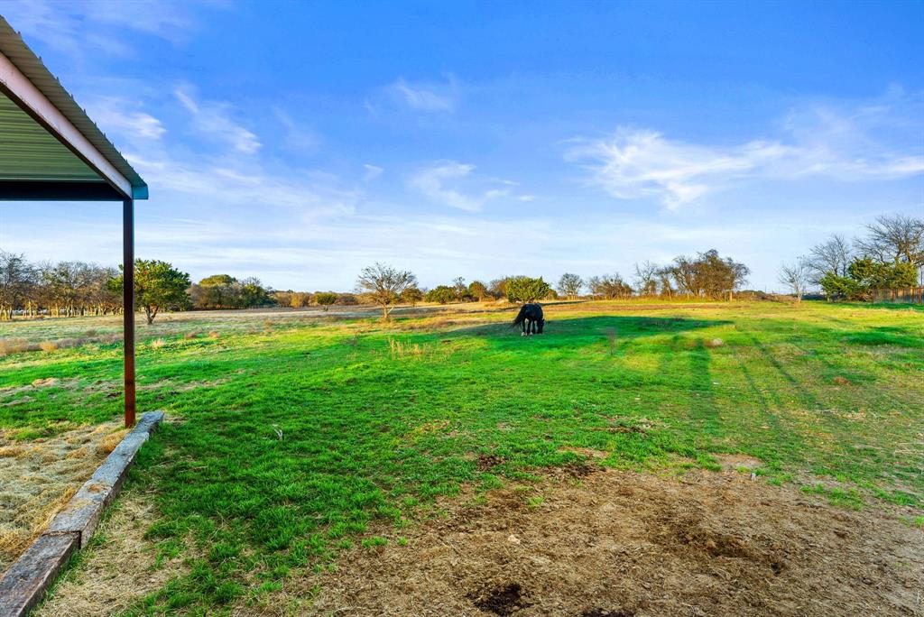 2700 Auction Barn Road Belton, TX 76513 - Photo 23 of 38 a view of a golf course with a big yard