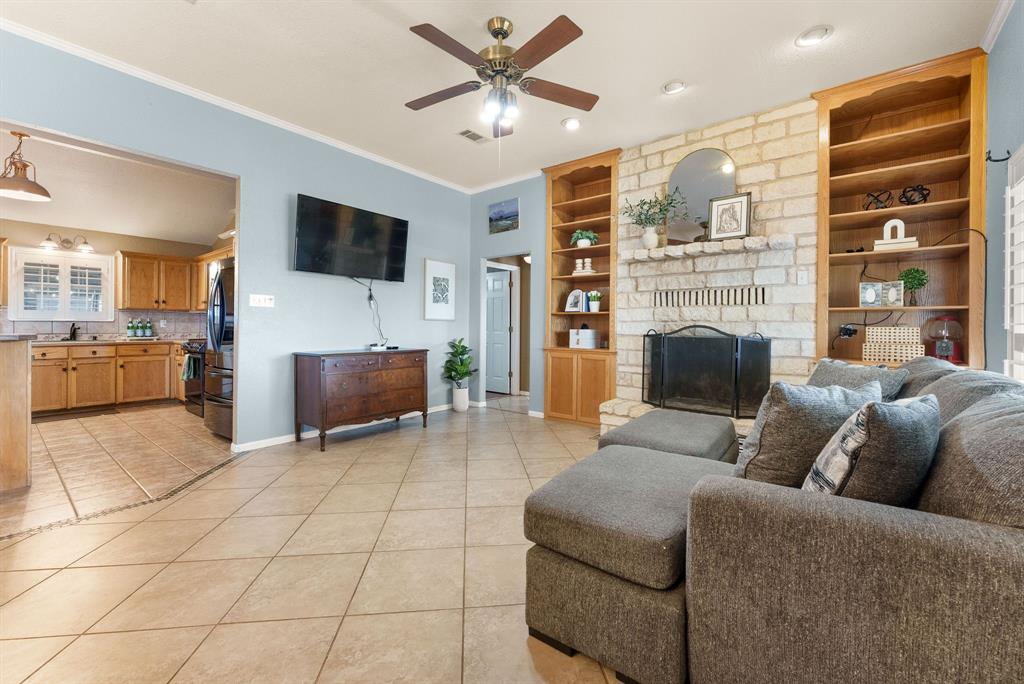 2700 Auction Barn Road Belton, TX 76513 - Photo 6 of 38 a living room with furniture and a fireplace
