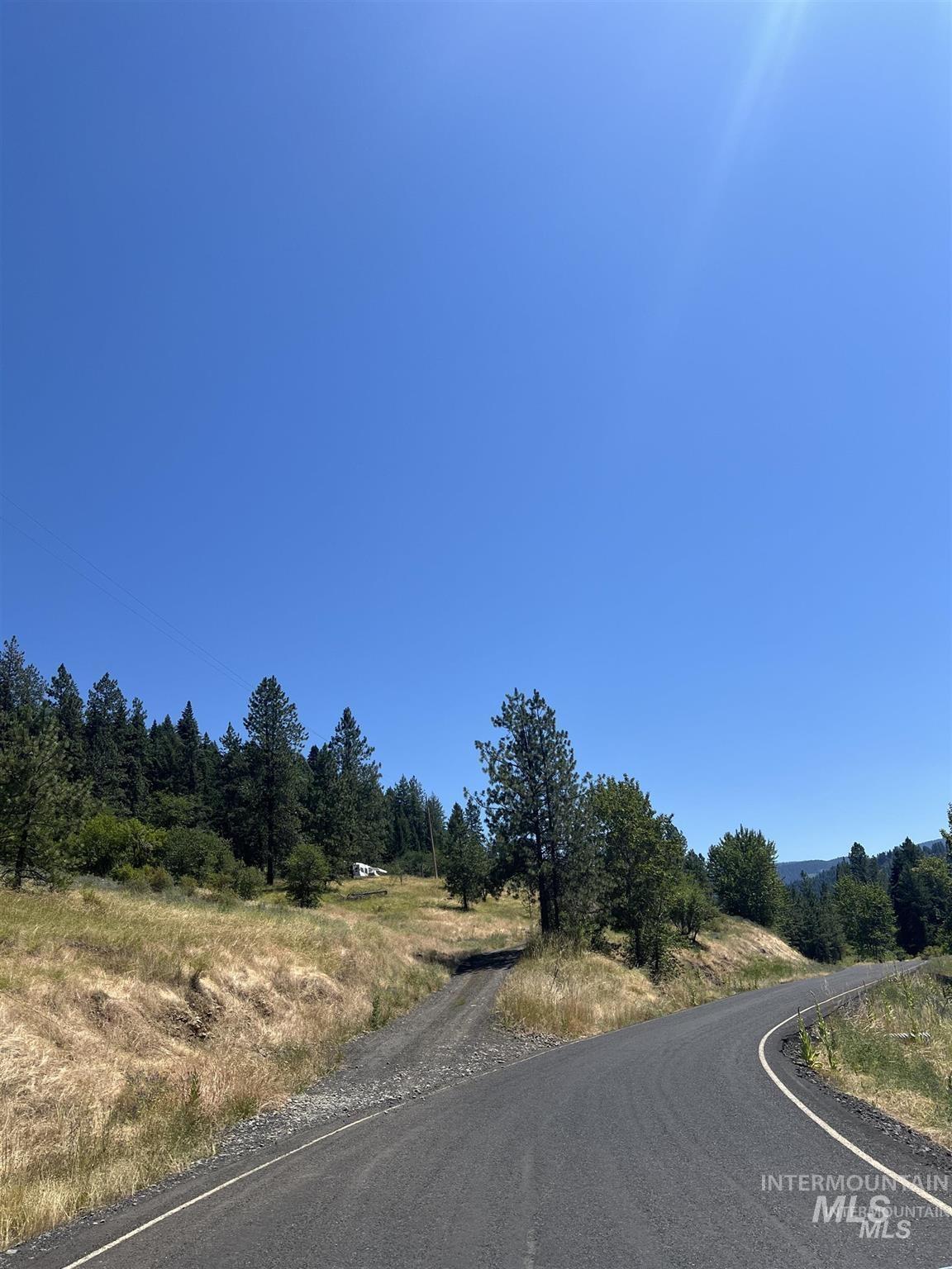 Nka Clearcreek Road Kooskia, ID 83539 - Photo 2 of 25 View of asphalt road with a rural view