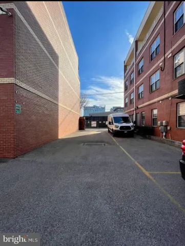 a front view of a house with a barbeque