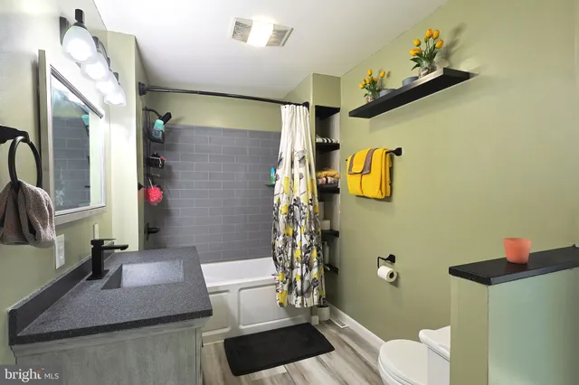 a view of kitchen and sink