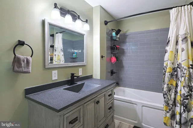 a bedroom with bed and a closet