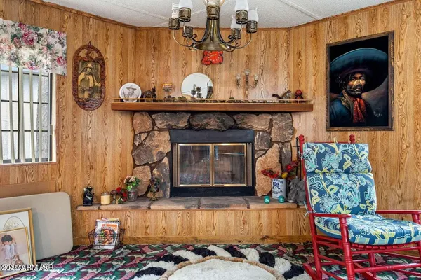 a bedroom with a bed and a large dresser