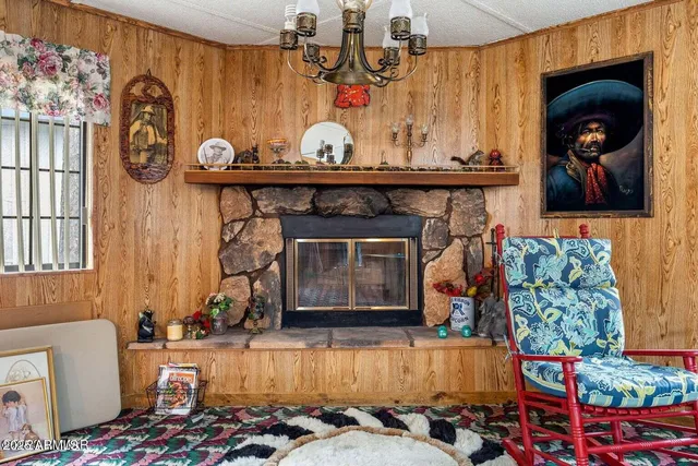 a bedroom with a bed and a large dresser