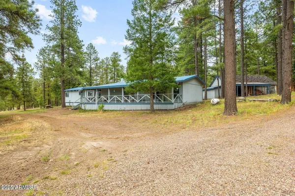 a view of balcony with wooden floor and outdoor space