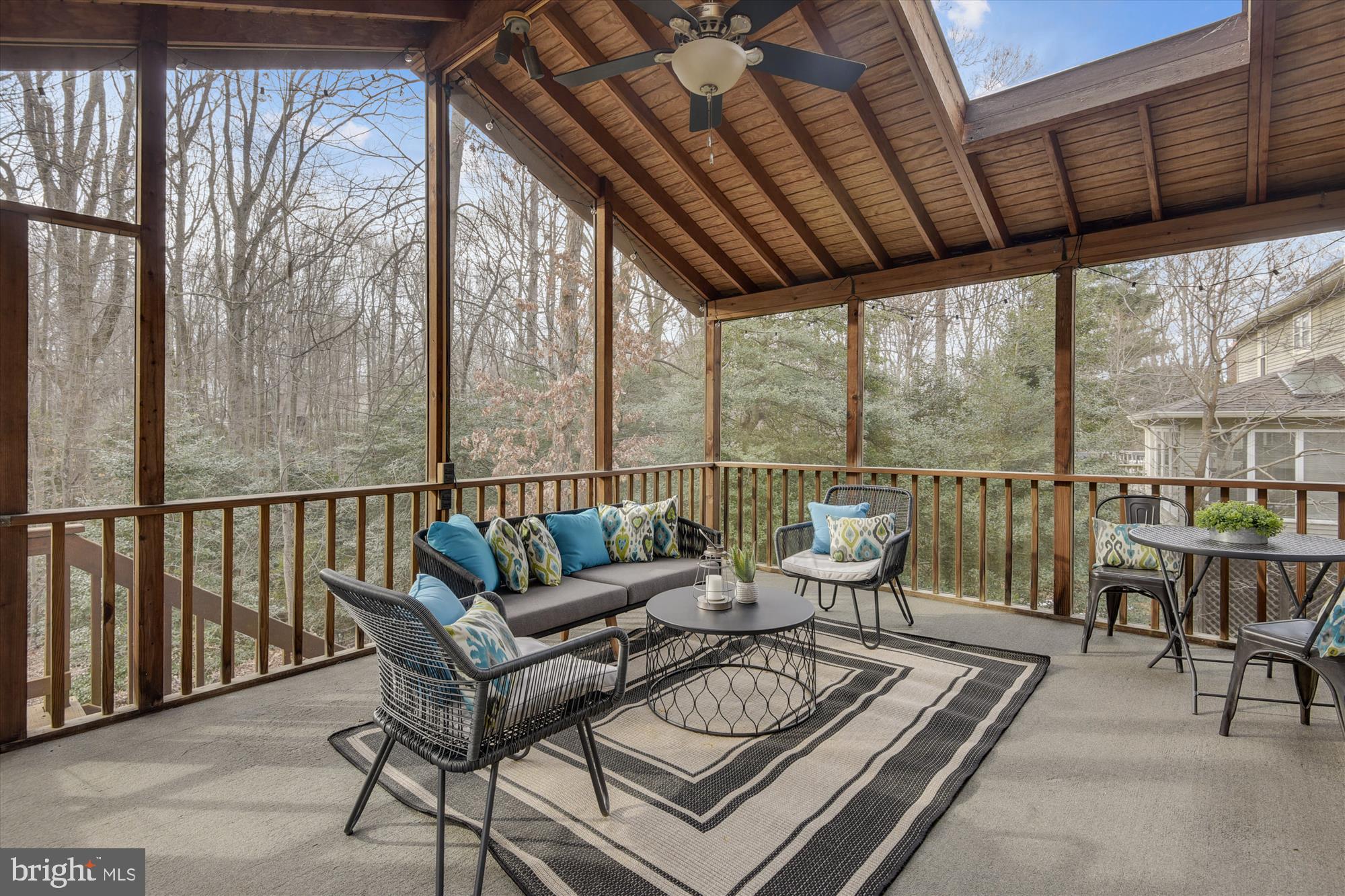 11874 Fawn Ridge Lane Reston, VA 20194 - Photo 11 of 75 a balcony with furniture and a large window