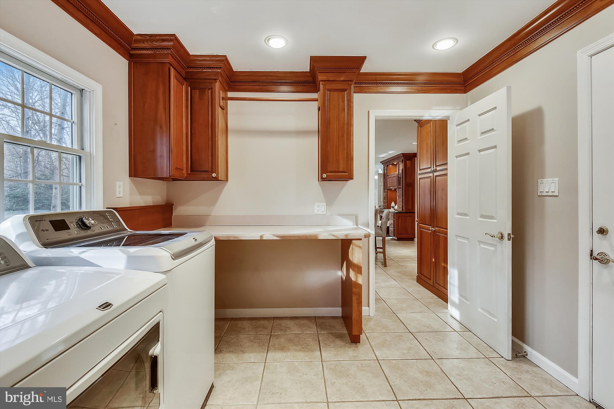 11874 Fawn Ridge Lane Reston, VA 20194 - Photo 21 of 75 a kitchen with a refrigerator and a stove top oven