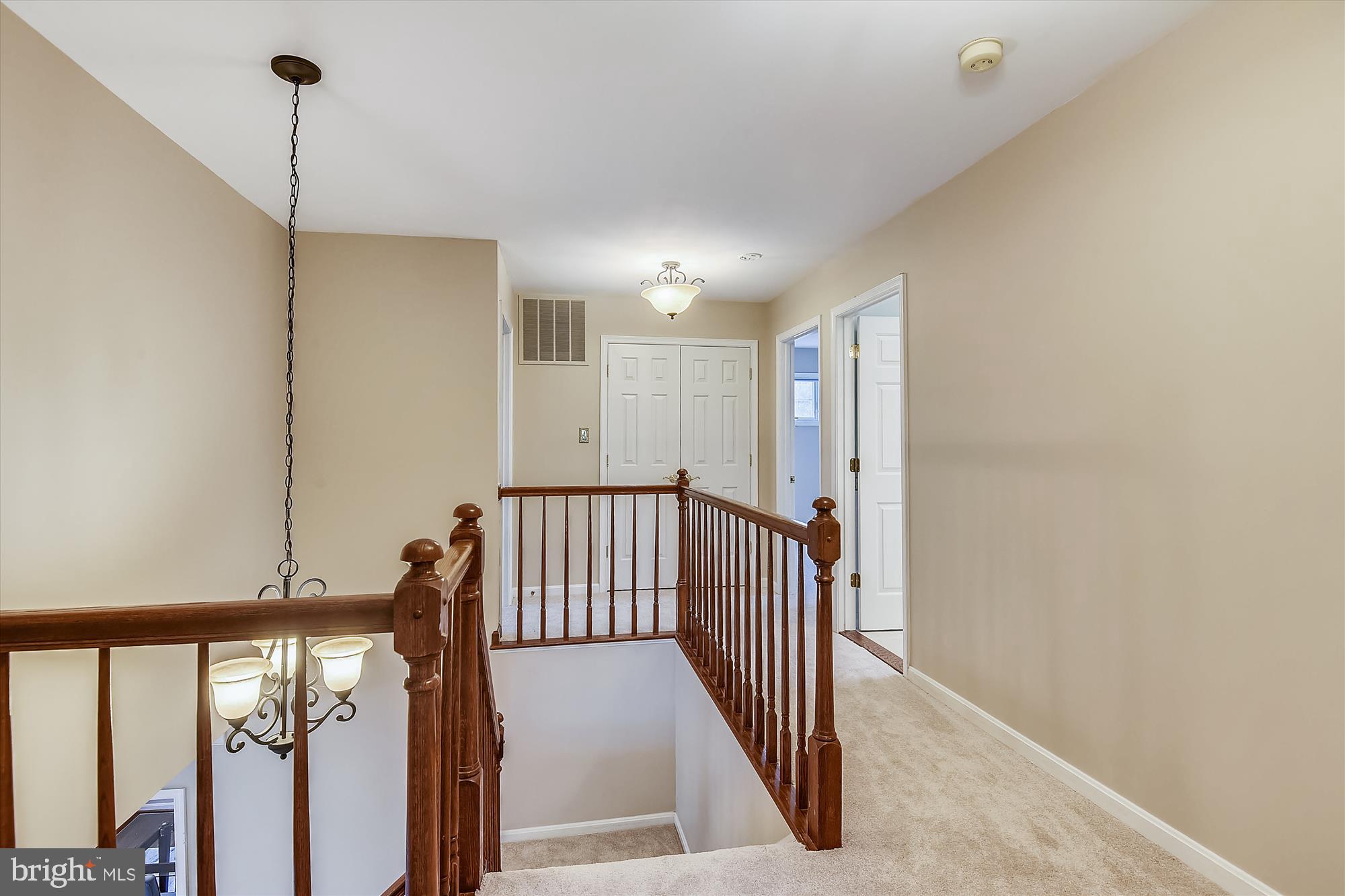 11874 Fawn Ridge Lane Reston, VA 20194 - Photo 36 of 75 a view of a hallway with windows