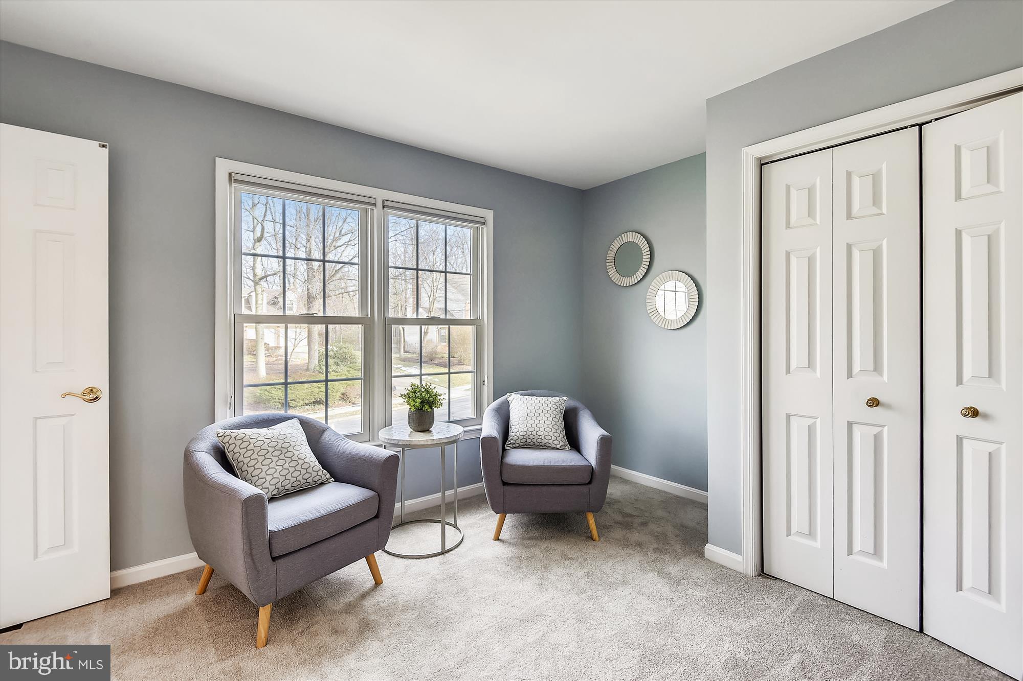 11874 Fawn Ridge Lane Reston, VA 20194 - Photo 43 of 75 a living room with furniture and a window