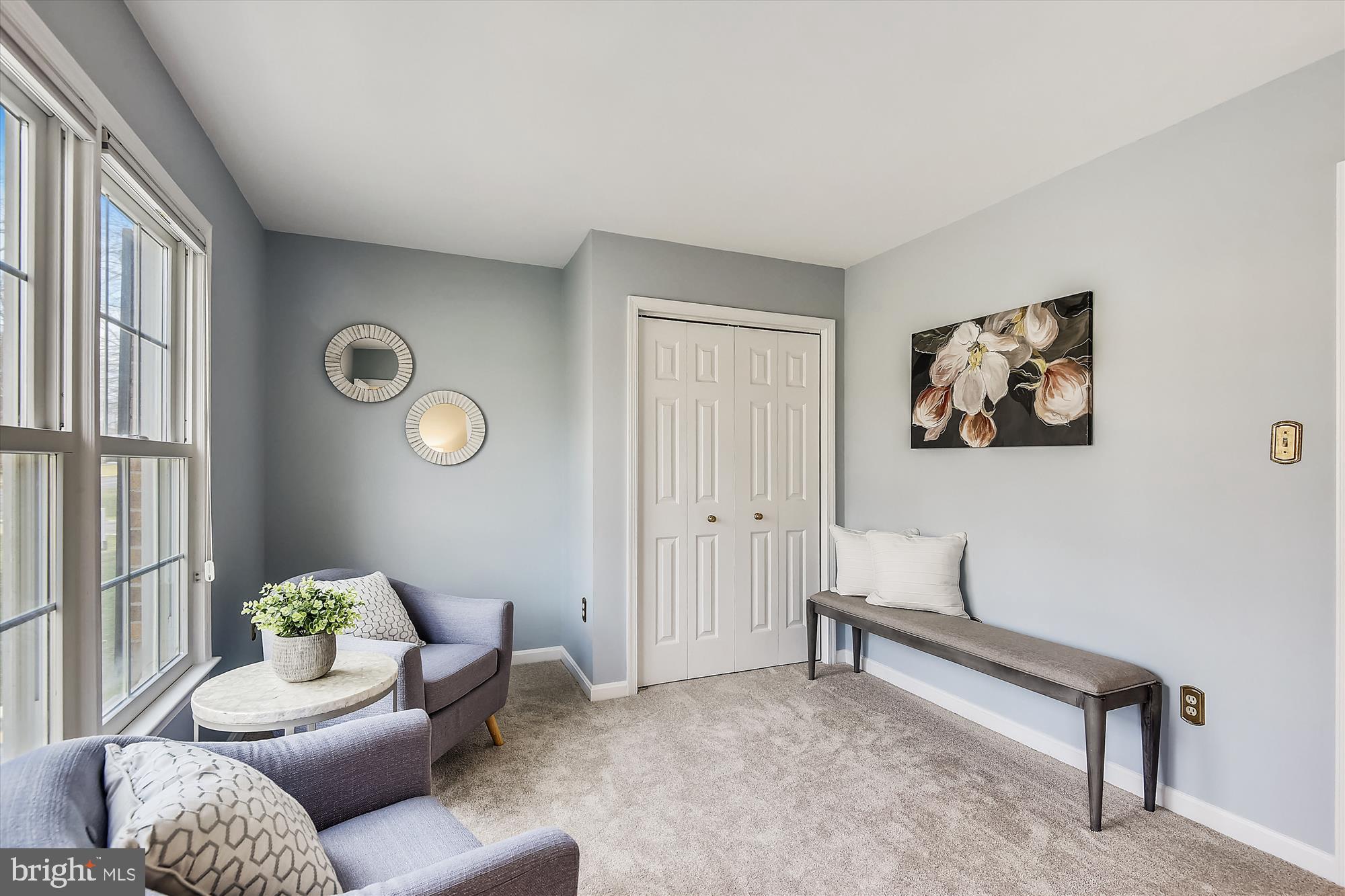 11874 Fawn Ridge Lane Reston, VA 20194 - Photo 45 of 75 a living room with furniture and a window