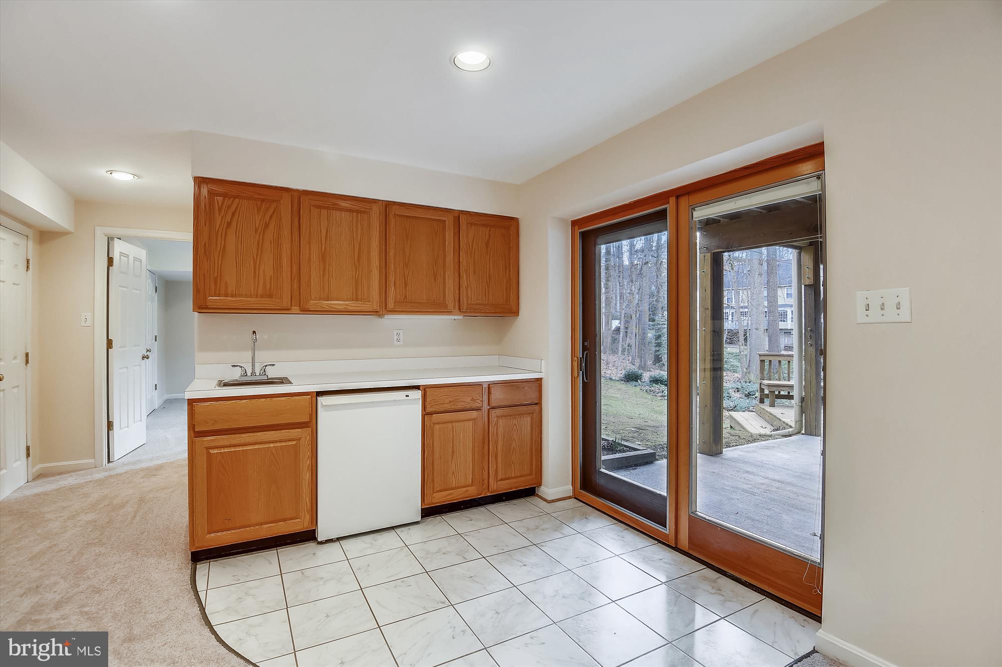 11874 Fawn Ridge Lane Reston, VA 20194 - Photo 49 of 75 a kitchen with granite countertop cabinets and steel stainless steel appliances