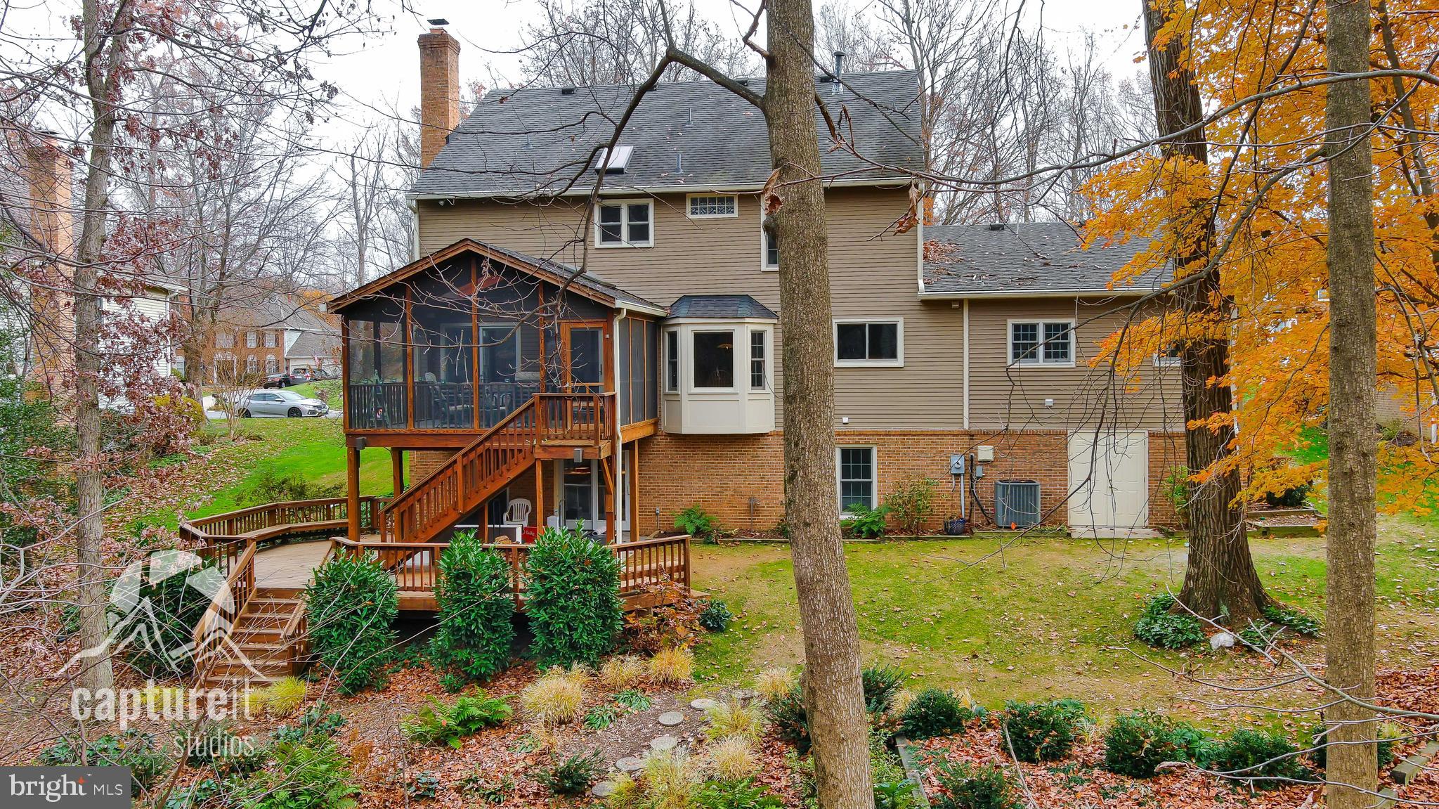 11874 Fawn Ridge Lane Reston, VA 20194 - Photo 65 of 75 front view of a house with a yard