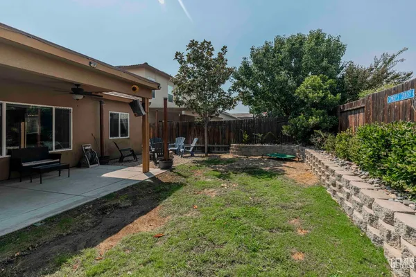 a view of outdoor space with shower and trees